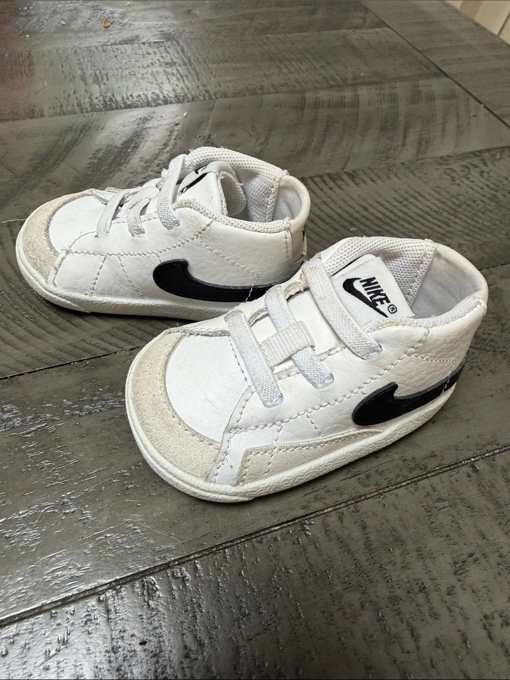 Nike Kids White Sneakers with Black Swoosh